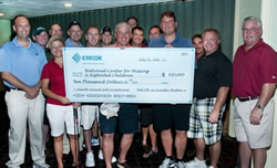 EMCOR presents $10,000 check donation for The National Center For Missing & Exploited Children (NCMEC).